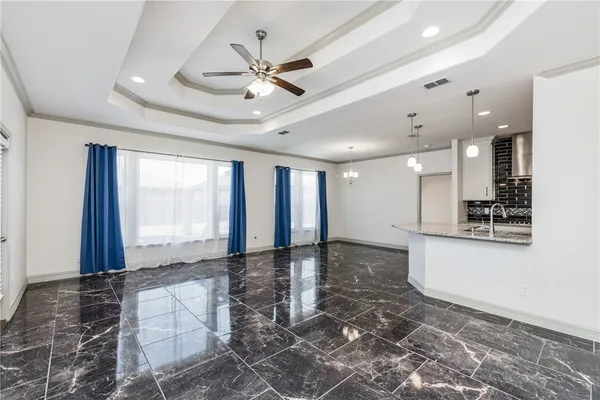 a view of an empty room and window