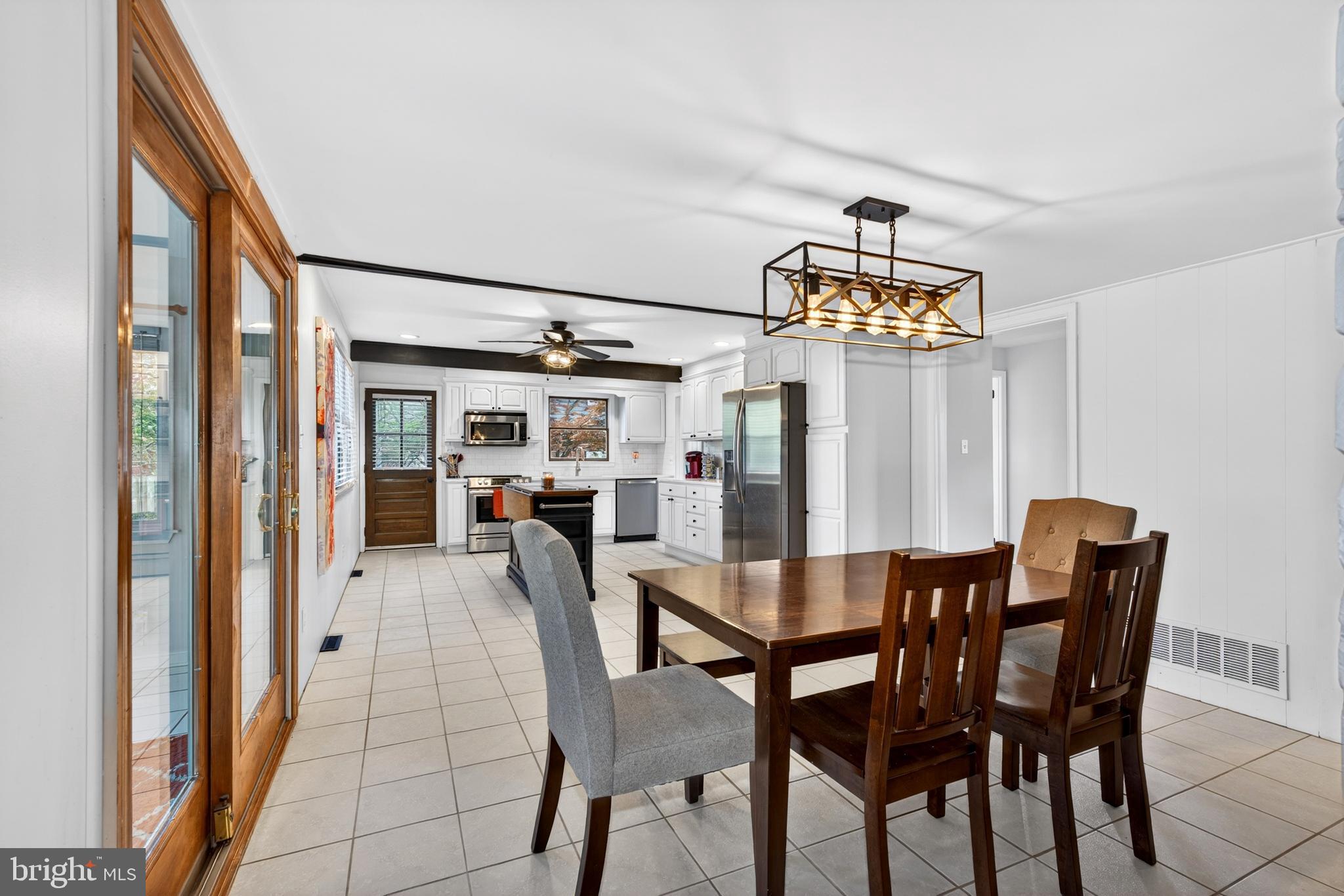 264 East Padonia Road Cockeysville, MD 21030 - Photo 14 of 53 a view of a dining room with furniture and chandelier