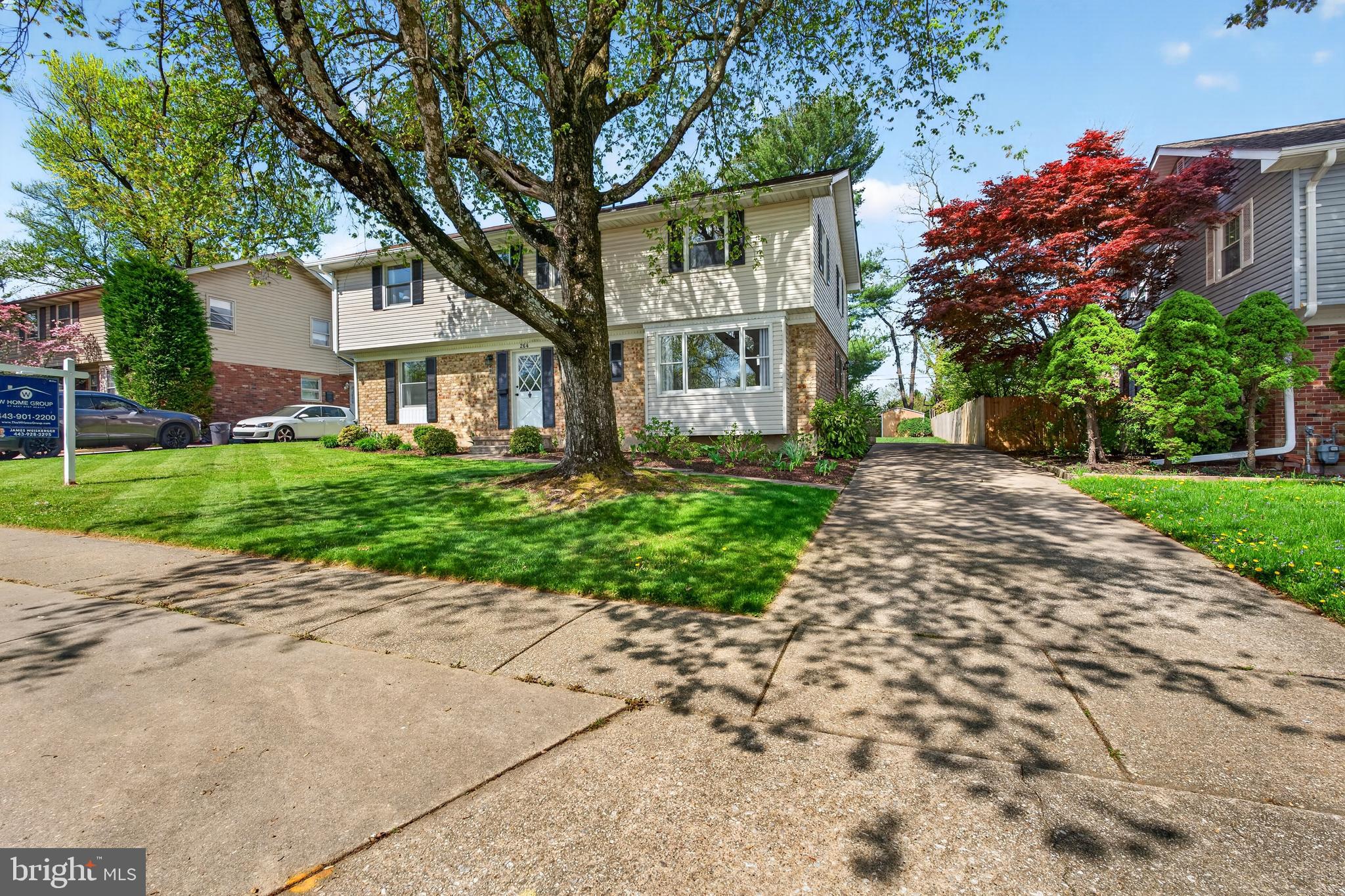 264 East Padonia Road Cockeysville, MD 21030 - Photo 2 of 53 a front view of a house with a garden and trees