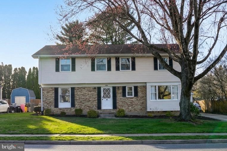 264 East Padonia Road Cockeysville, MD 21030 - Photo 2 of 2 a front view of a house with a yard