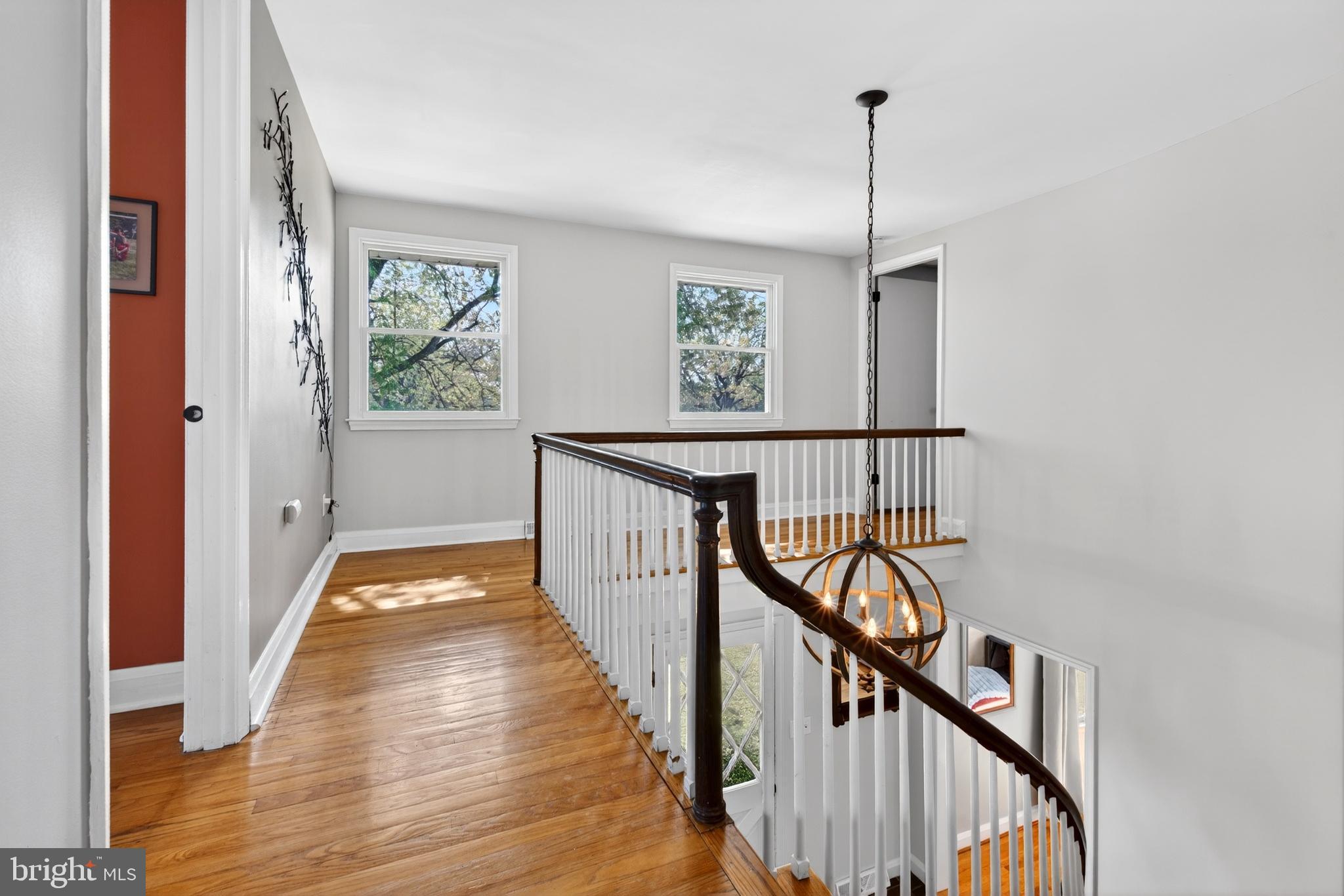 264 East Padonia Road Cockeysville, MD 21030 - Photo 24 of 53 a view of a hallway with wooden floor and staircase