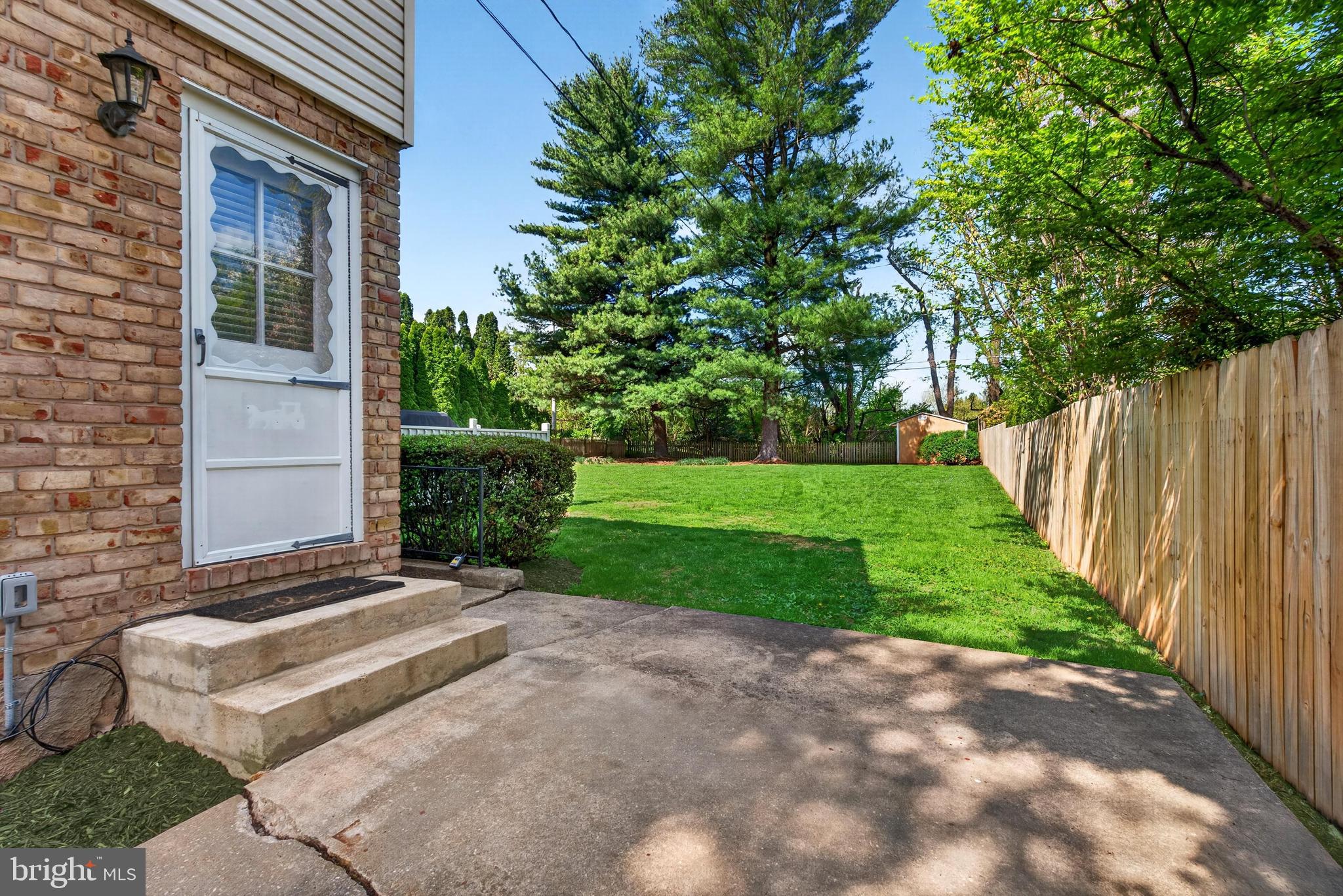 264 East Padonia Road Cockeysville, MD 21030 - Photo 49 of 53 a view of a house with backyard and a garden