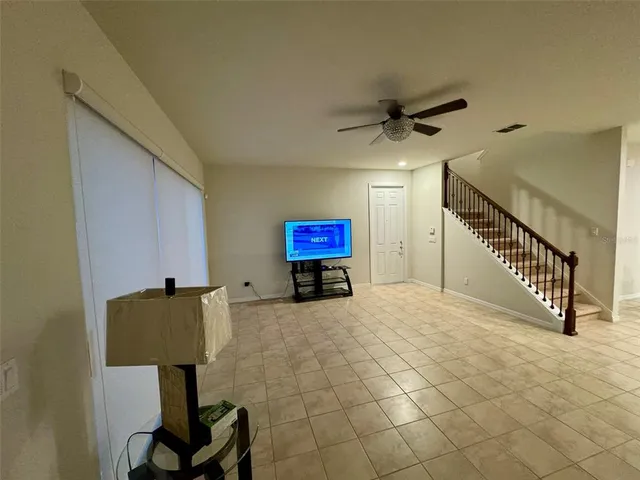 a view of a livingroom with a staircase