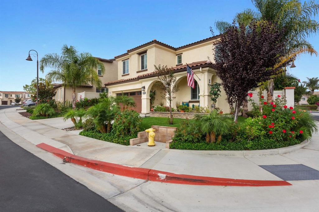 4260 C. Del Vista Oceanside, CA 92057 - Photo 1 of 38 a front view of a house with a yard and potted plants