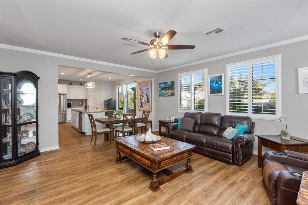 4260 C. Del Vista Oceanside, CA 92057 - Photo 11 of 38 a living room with furniture and a large window