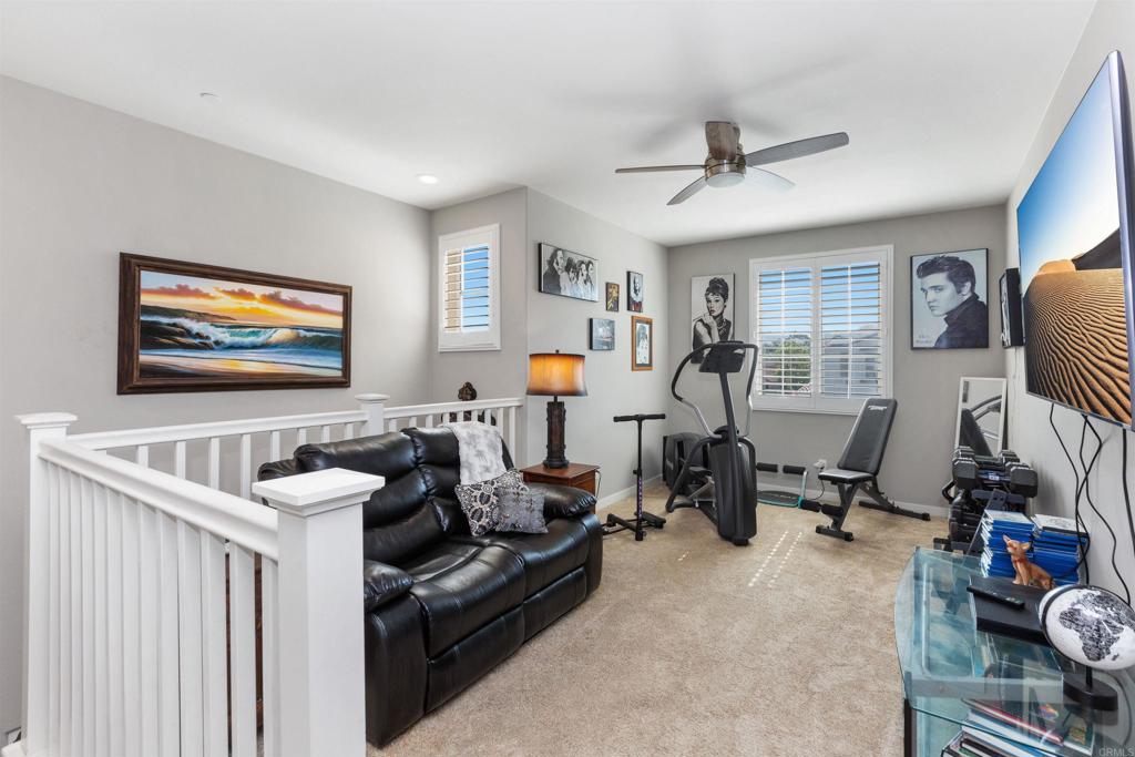4260 C. Del Vista Oceanside, CA 92057 - Photo 18 of 38 a living room with furniture and a flat screen tv