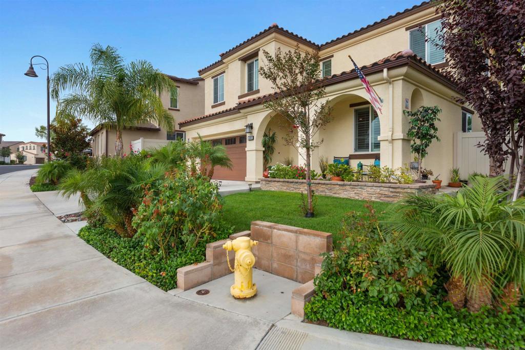 4260 C. Del Vista Oceanside, CA 92057 - Photo 2 of 38 a front view of a house with garden