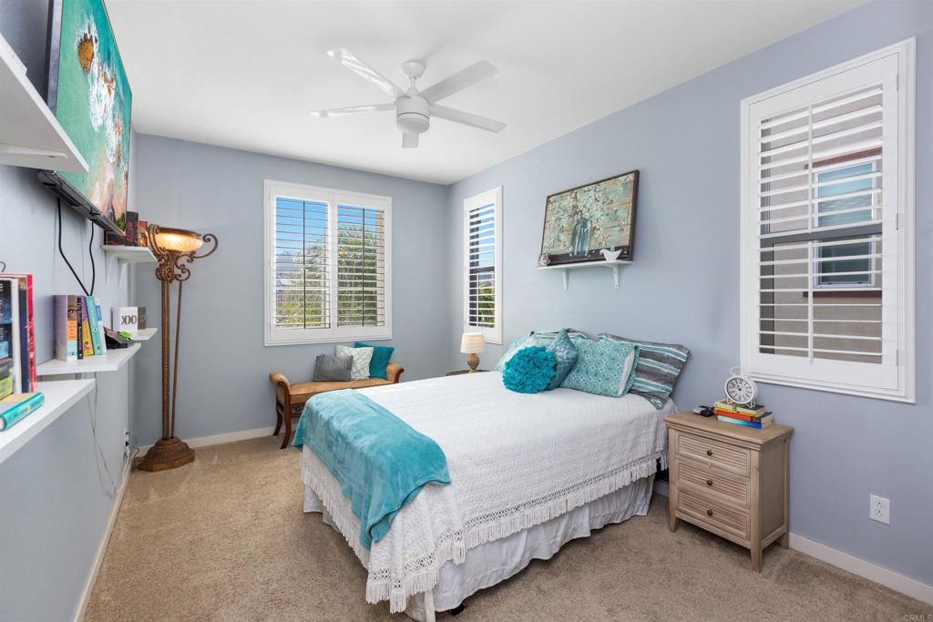 4260 C. Del Vista Oceanside, CA 92057 - Photo 22 of 38 a bedroom with a bed and a window