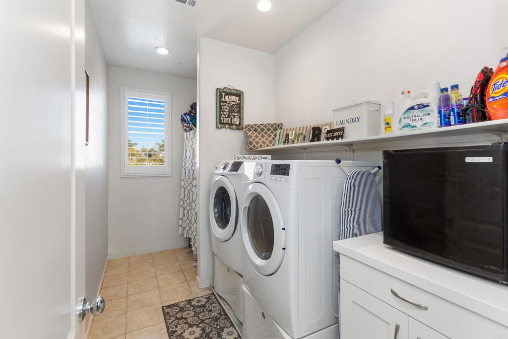 4260 C. Del Vista Oceanside, CA 92057 - Photo 26 of 38 a utility room with sink dryer and washer