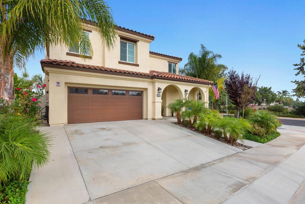 4260 C. Del Vista Oceanside, CA 92057 - Photo 3 of 38 a front view of a house with a yard and garage