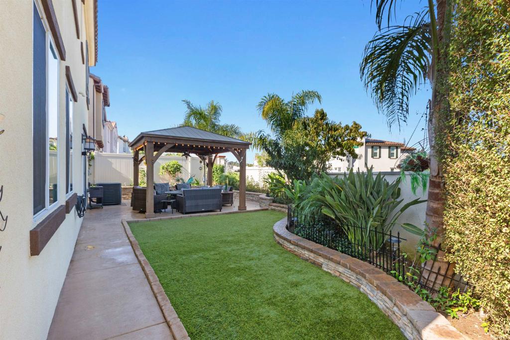 4260 C. Del Vista Oceanside, CA 92057 - Photo 31 of 38 a view of a front of a house with a yard