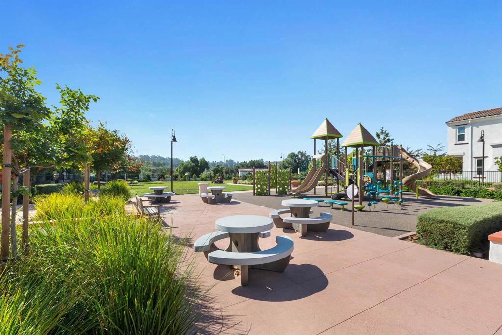 4260 C. Del Vista Oceanside, CA 92057 - Photo 34 of 38 a view of a swimming pool with outdoor seating