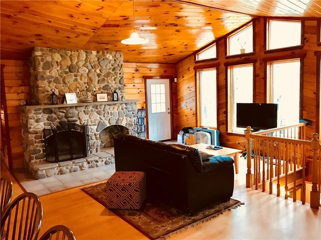 505 Arrowsic Road Arrowsic, ME 04530 - Photo 10 of 22 Stone place in living room with big...