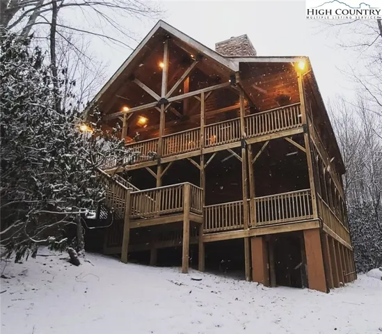 a view of an chairs and tables in the balcony