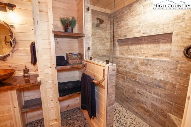 a view of a patio with table and chairs