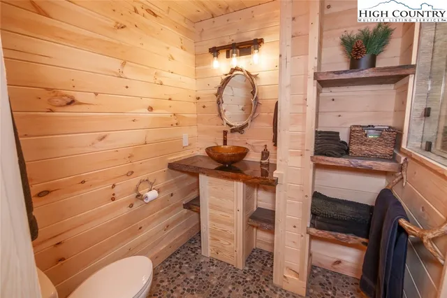 a view of balcony with furniture