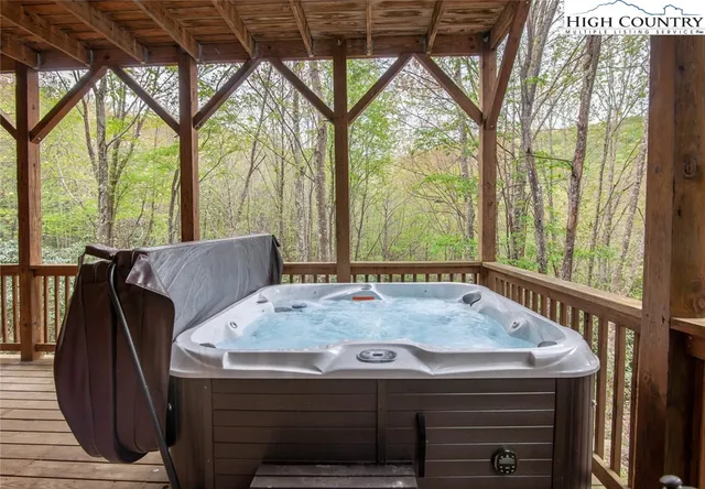 a view of a balcony with furniture