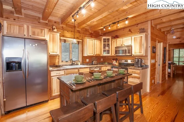 a bathroom with a shower and a toilet