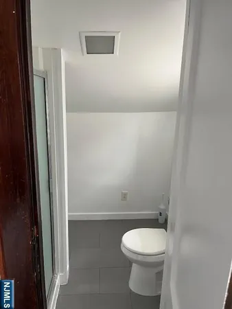 a bathroom with a toilet
