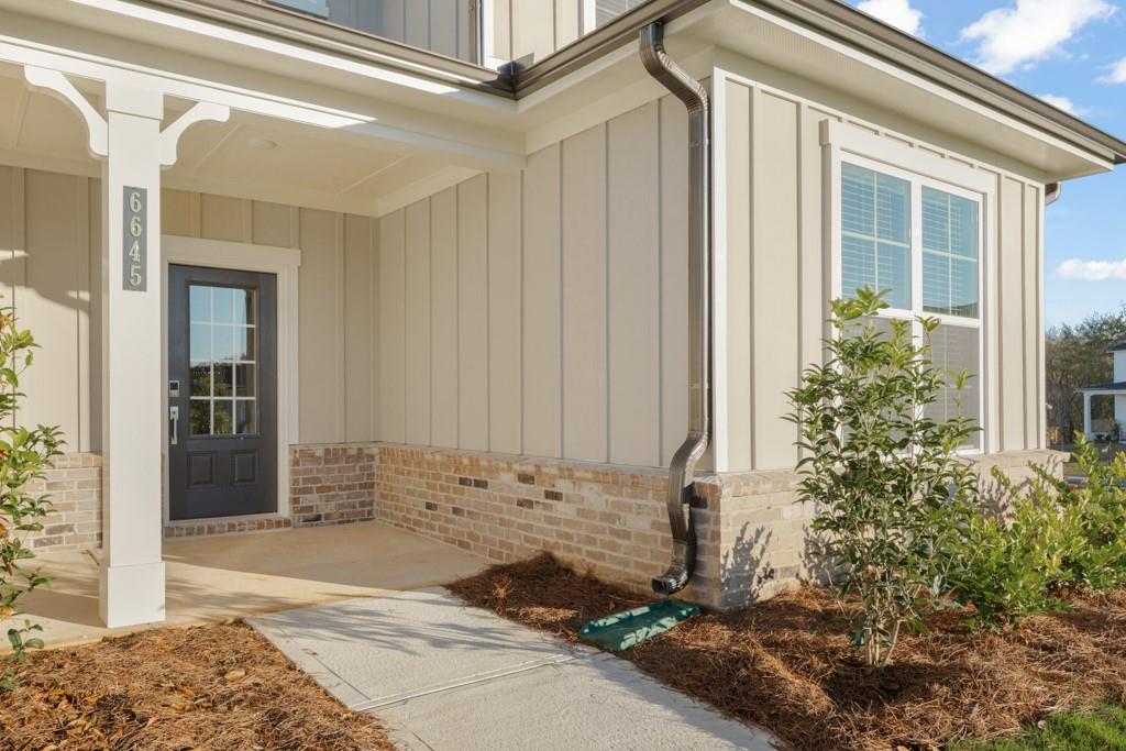 6725 Settingdown Crk Drive Dawsonville, GA 30534 - Photo 2 of 41 a front view of a house