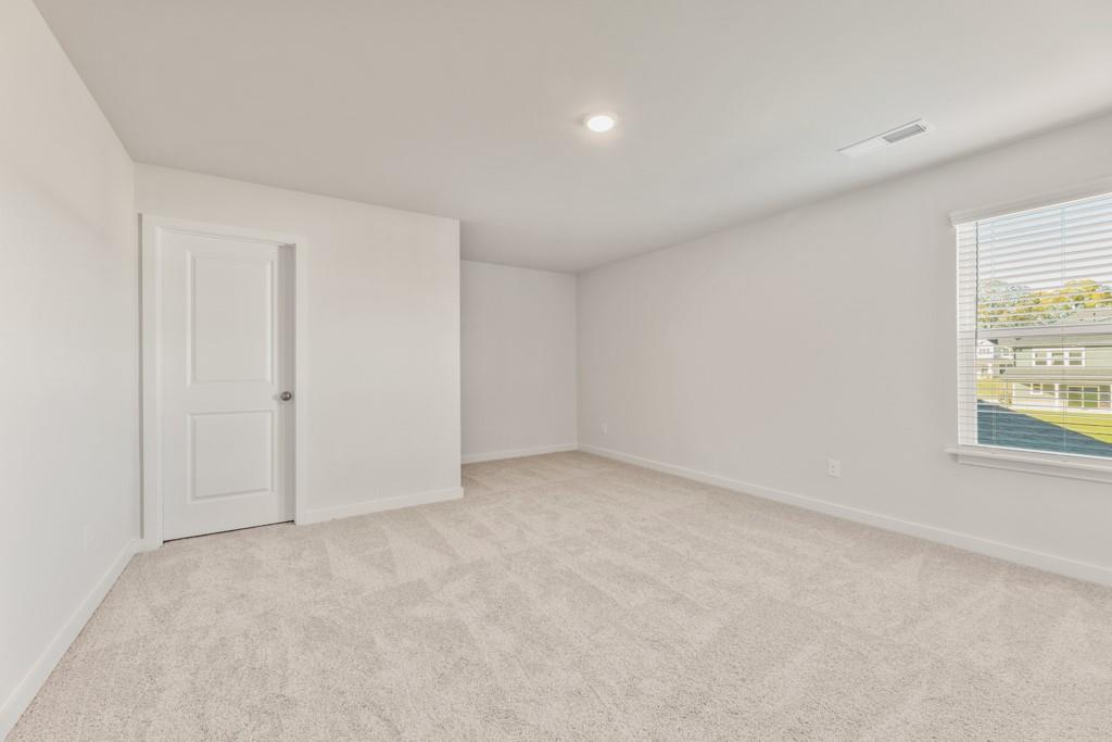 6725 Settingdown Crk Drive Dawsonville, GA 30534 - Photo 29 of 41 an empty room with windows