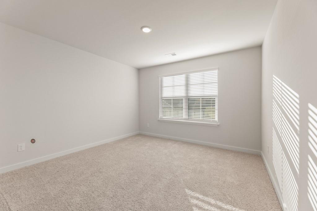 6725 Settingdown Crk Drive Dawsonville, GA 30534 - Photo 35 of 41 an empty room with a window