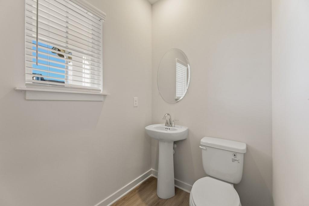 6725 Settingdown Crk Drive Dawsonville, GA 30534 - Photo 10 of 41 a bathroom with a toilet and a sink