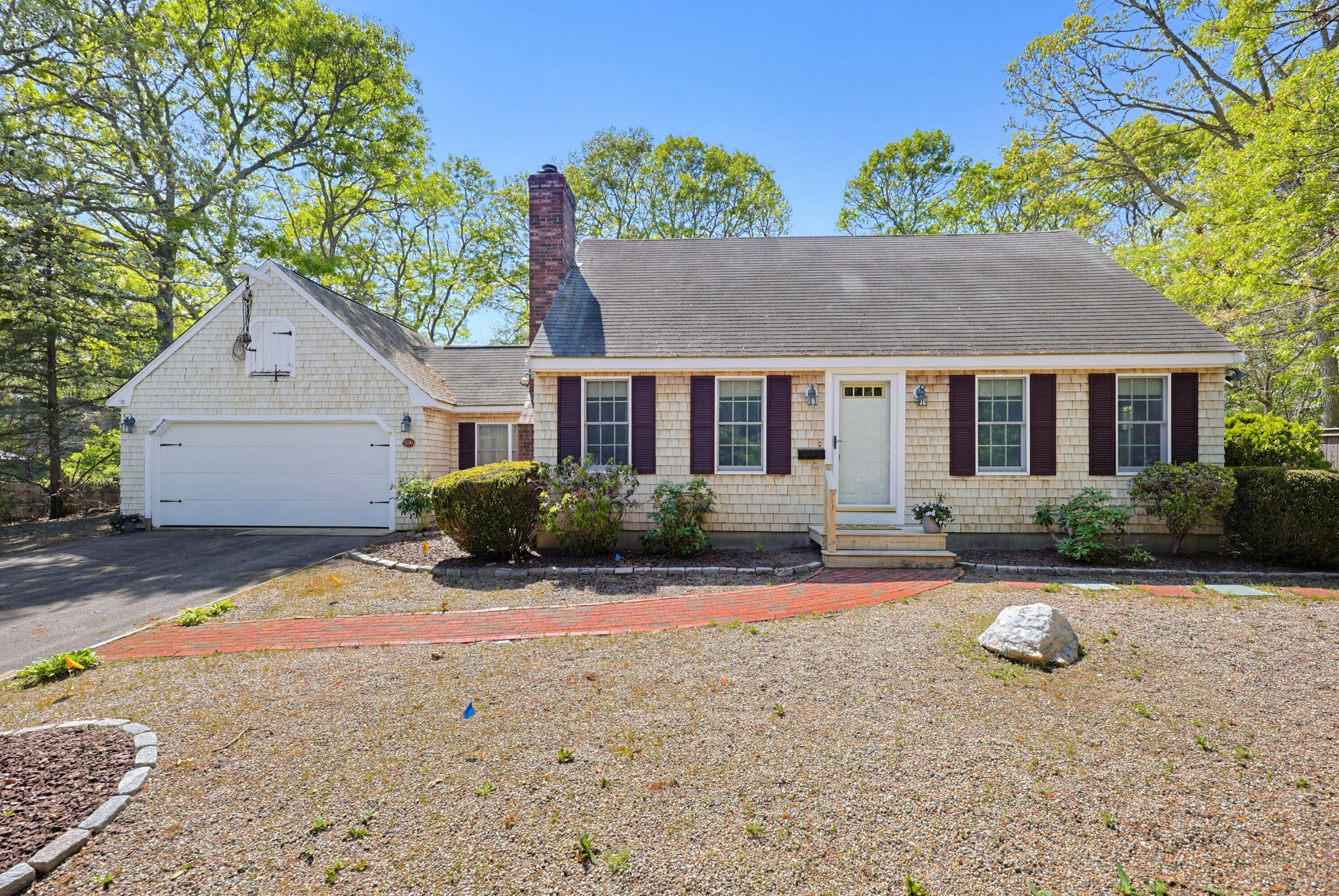 556 Cotuit Road Mashpee, MA 02649 - Photo 40 of 45 a view of a house with backyard and sitting area
