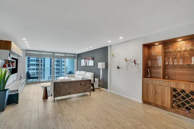 a kitchen with a sink and a large window