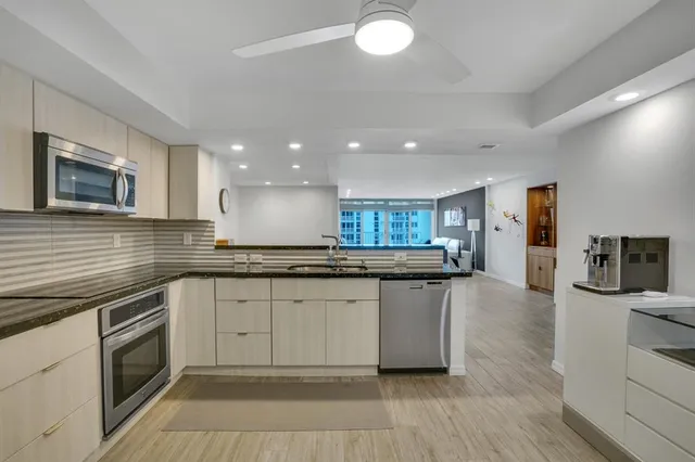 a view of a swimming pool with a lounge chairs