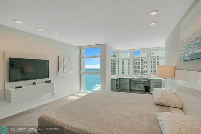 a bathroom with a sink double vanity and a mirror