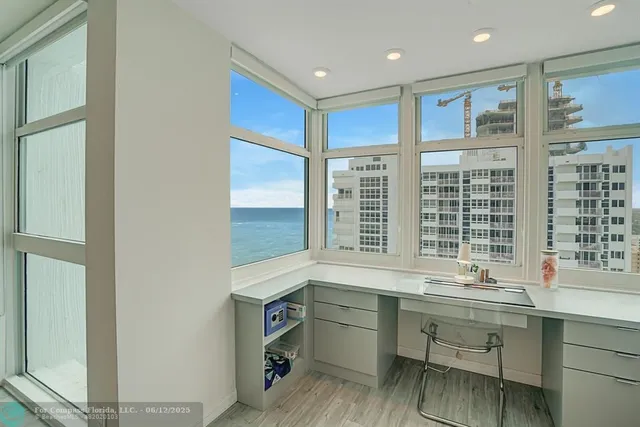 a bathroom with a toilet sink and shower