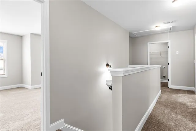 a view of a hallway with storage