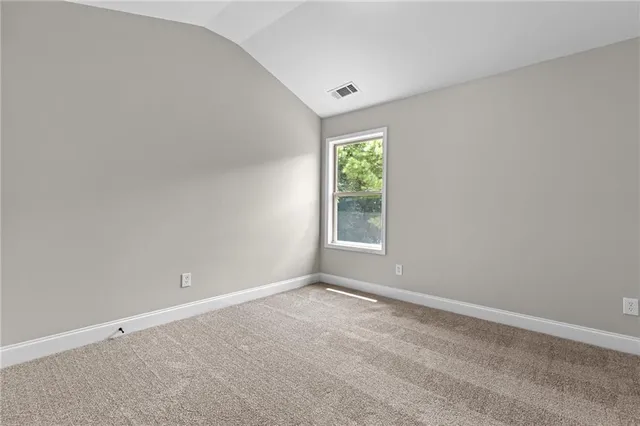 an empty room with window