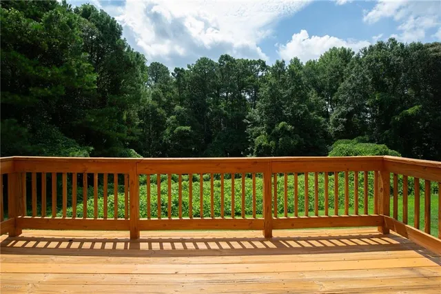 a view of a wooden fence