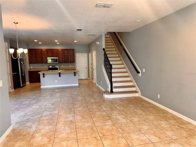 a view of a kitchen with a sink