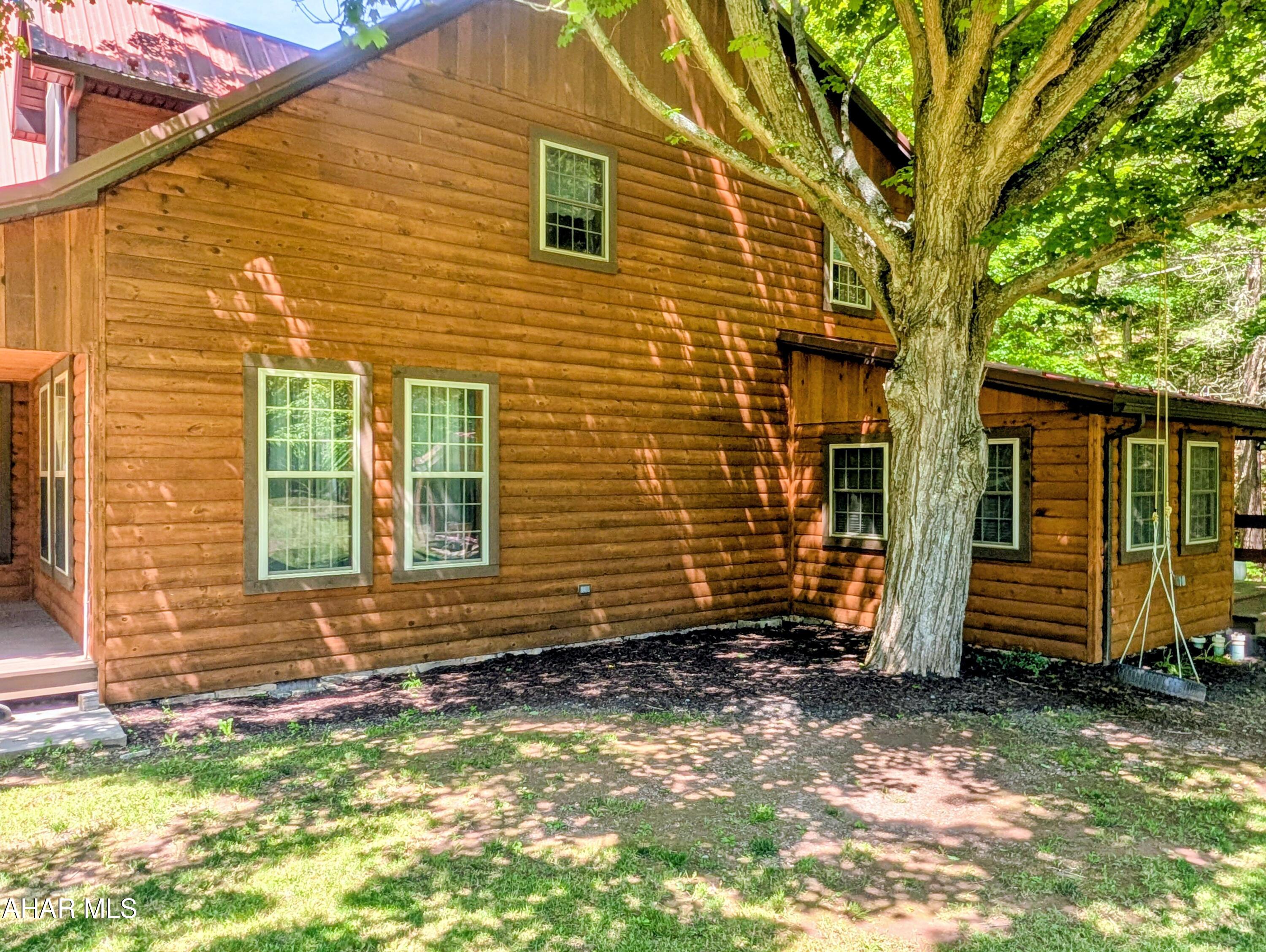 213 Sherman Valley Road Hopewell, PA 16650 - Photo 78 of 104 a view of a house with a yard