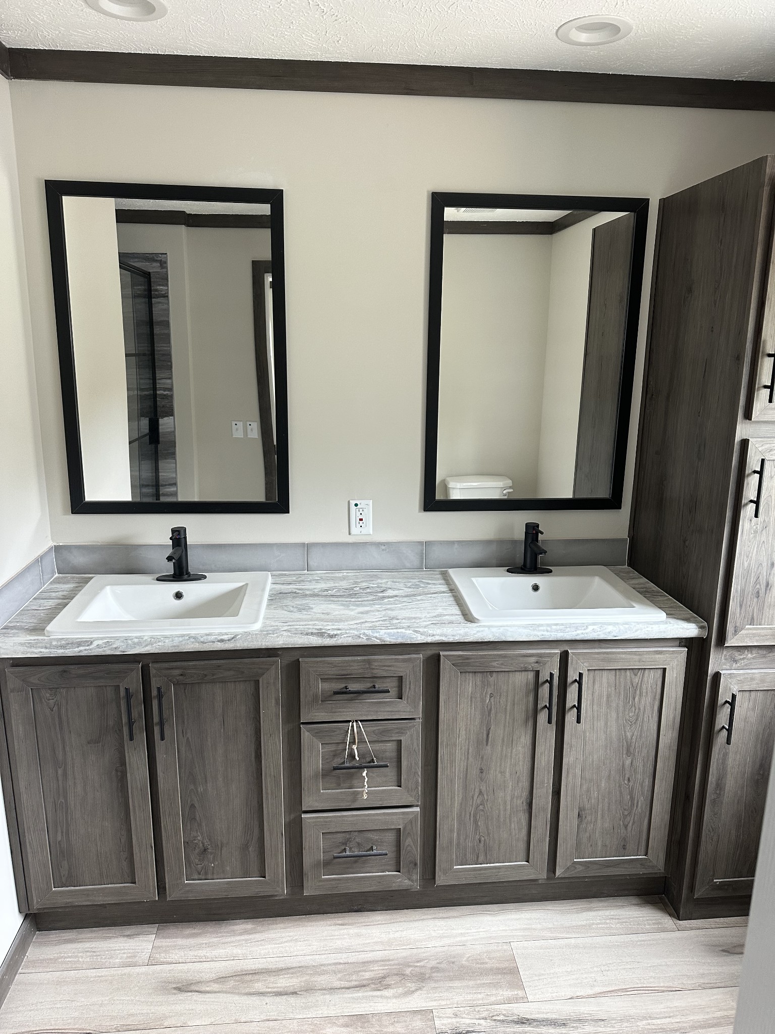 3340 Wixtown Road Westmoreland, TN 37186 - Photo 13 of 27 a bathroom with a double vanity sink and a mirror