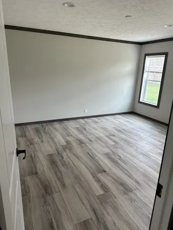 a view of a kitchen from the dinning room