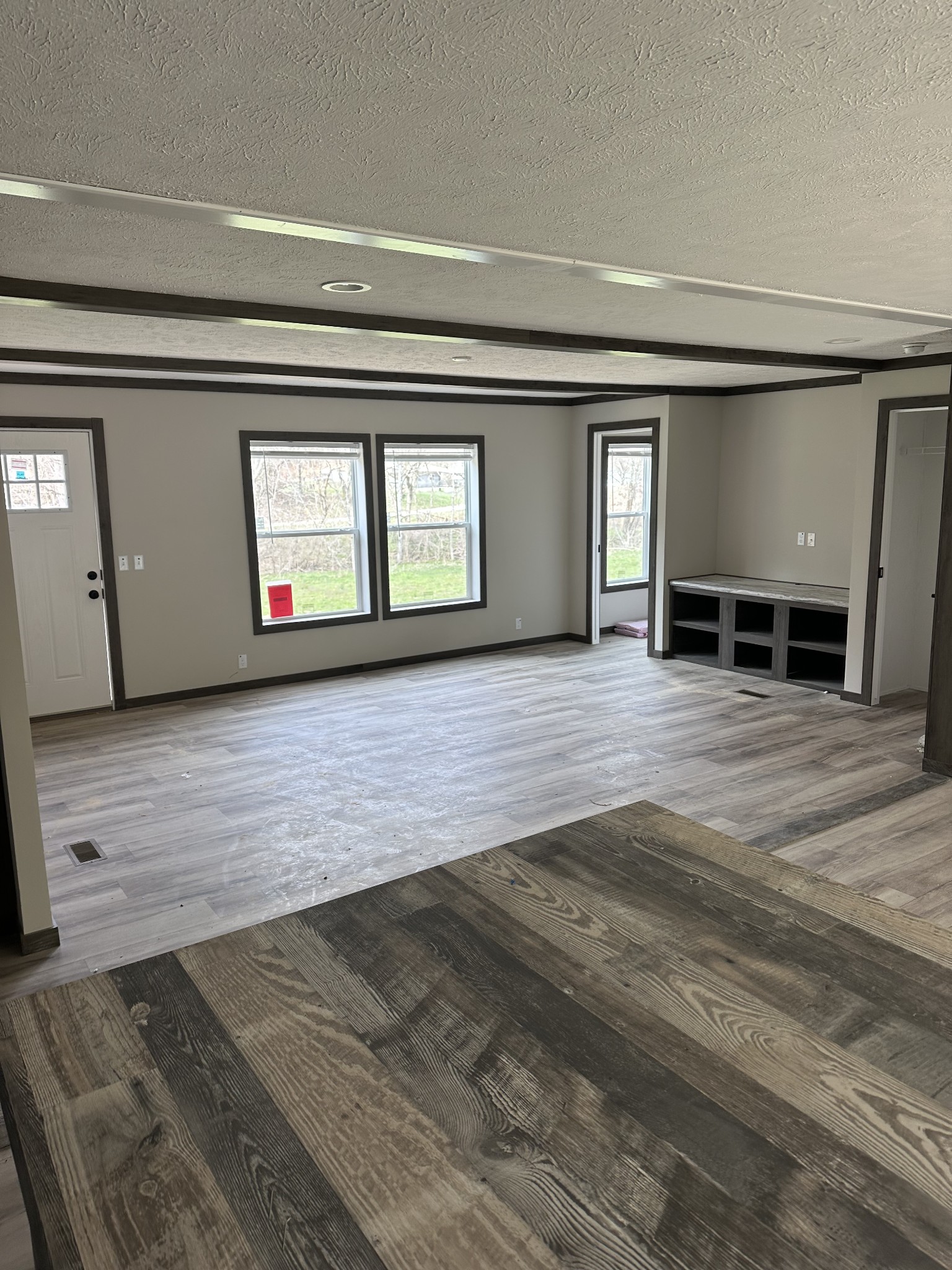 3340 Wixtown Road Westmoreland, TN 37186 - Photo 21 of 27 a view of empty room with wooden floor and window