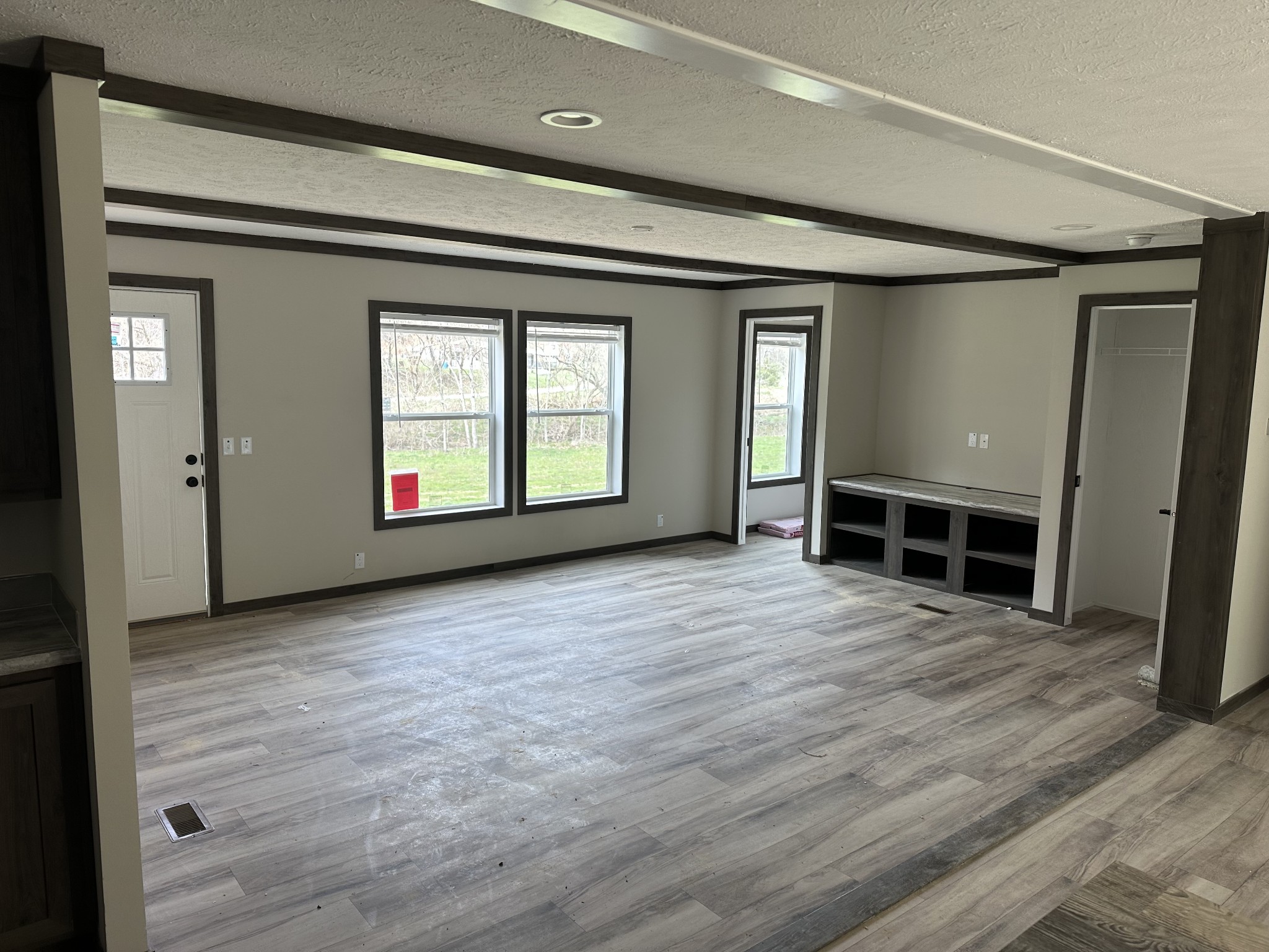 3340 Wixtown Road Westmoreland, TN 37186 - Photo 22 of 27 an empty room with wooden floor and windows
