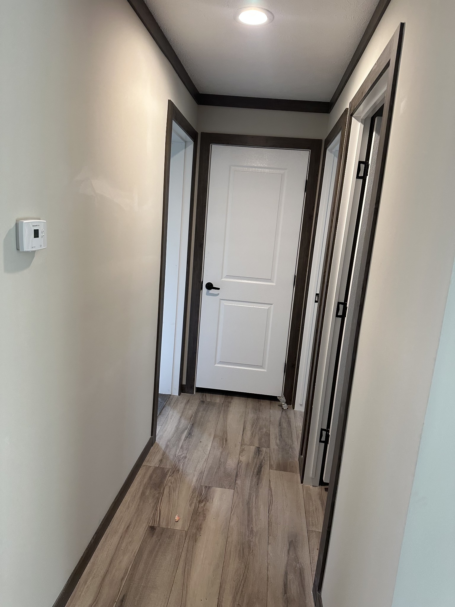 3340 Wixtown Road Westmoreland, TN 37186 - Photo 24 of 27 a view of a hallway with wooden floor