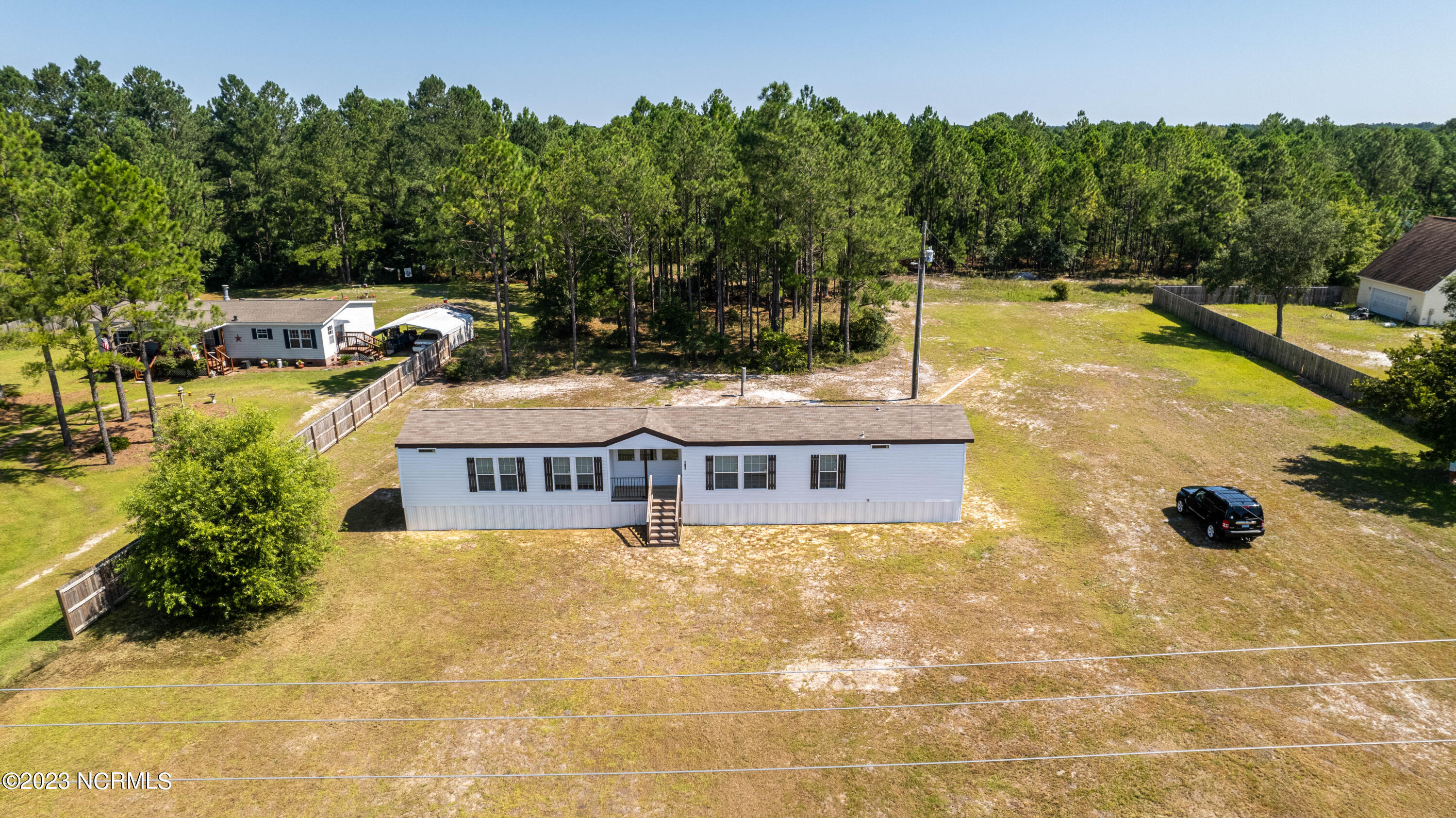 195 Folkstone Road Holly Ridge, NC 28445 - Photo 2 of 41 DJI_0140-HDR