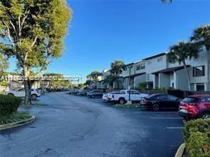 a view of a street with cars
