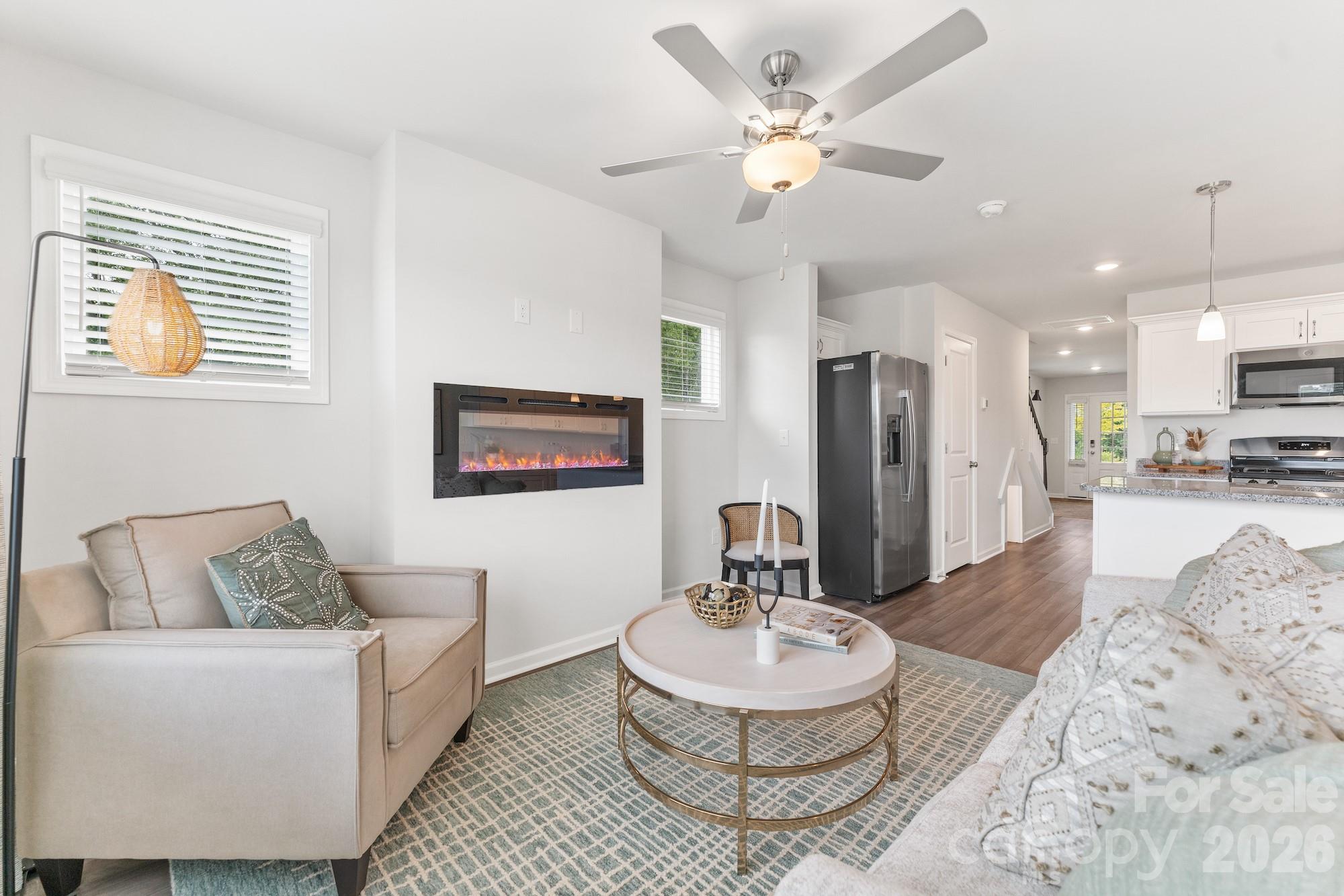 3005 Kingsfield Road, Unit 46 Charlotte, NC 28208 - Photo 11 of 15 a living room with furniture and a dining room