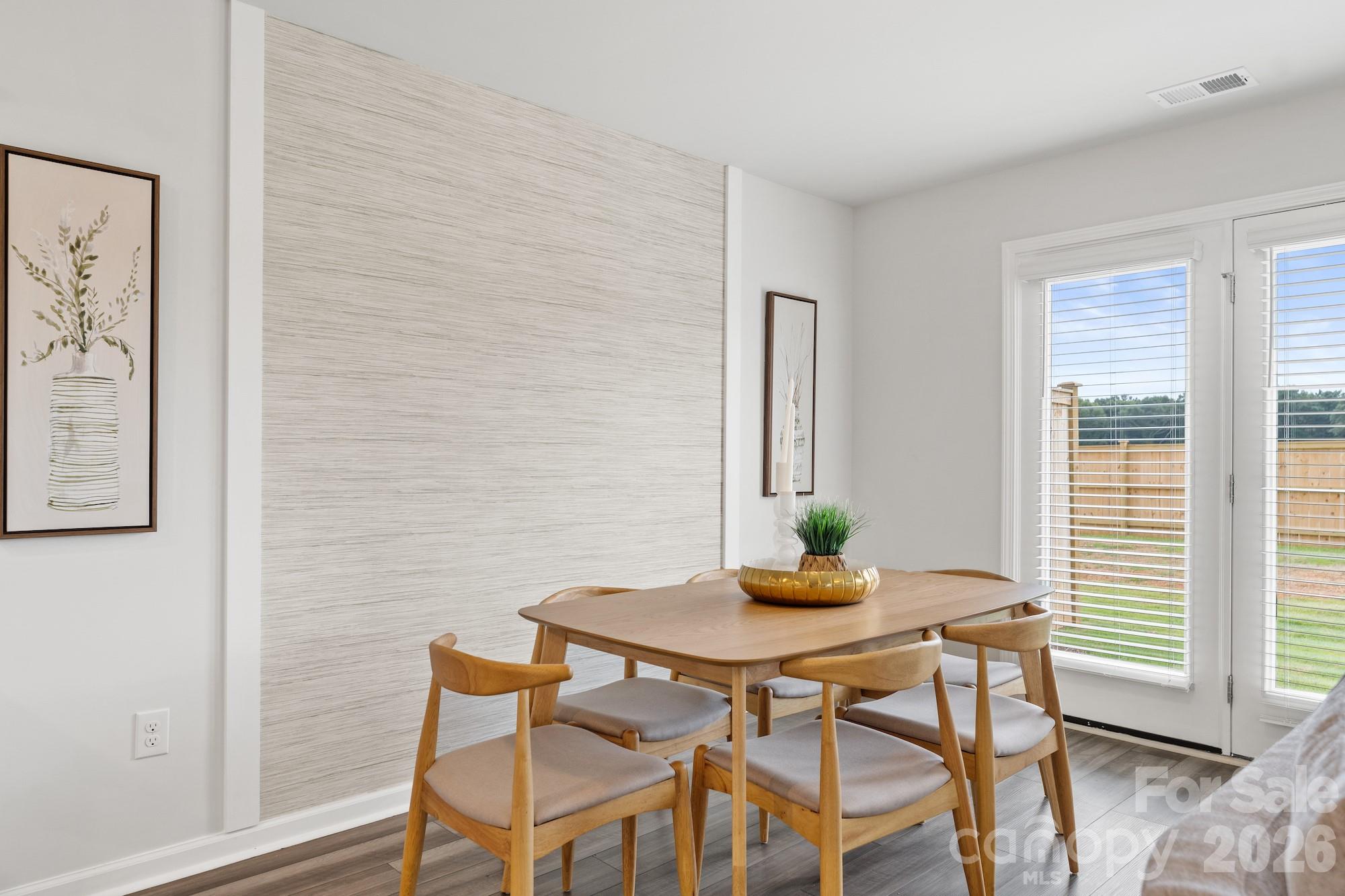 3005 Kingsfield Road, Unit 46 Charlotte, NC 28208 - Photo 6 of 15 a dining room with furniture and window