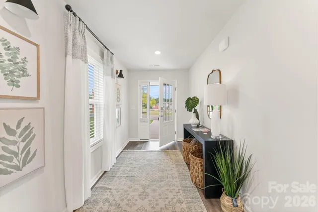 a view of entryway with livingroom and furniture