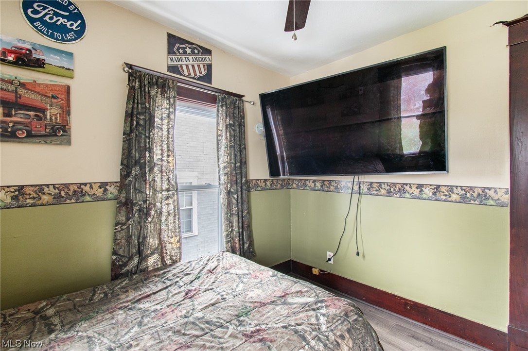 117 Morrison Street Struthers, OH 44471 - Photo 17 of 38 Bedroom featuring ceiling fan and hardwood / wood-style flooring