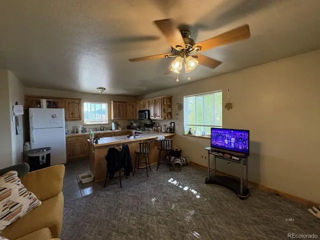 a view of a workspace with furniture