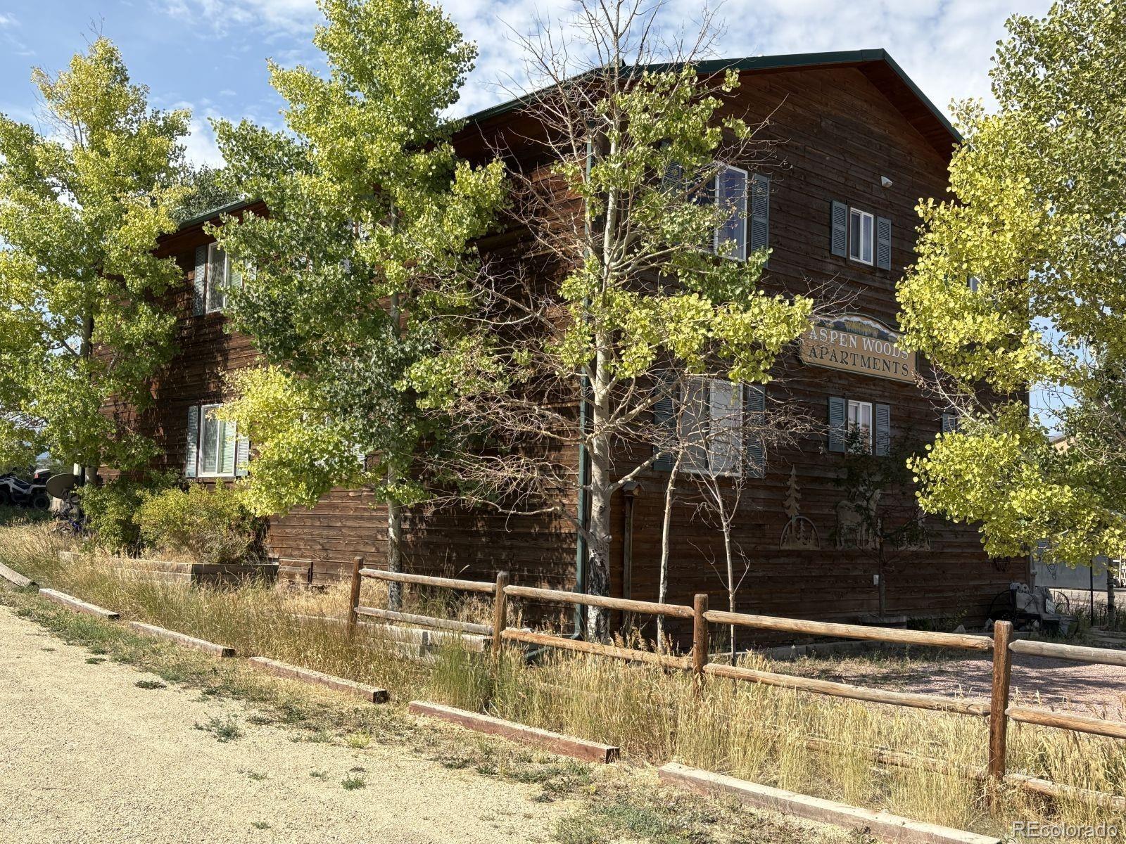 702 Main Street Silver Cliff, CO 81252 - Photo 19 of 20 a view of a backyard